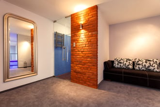 Comfortable couch in the corridor of loft